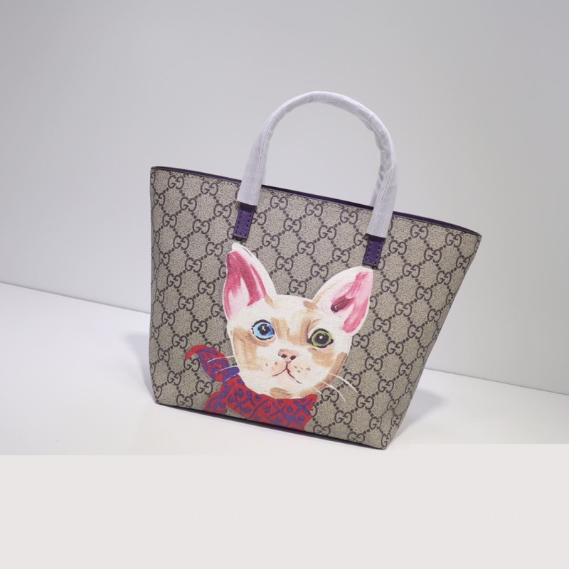 G*u*i shopping bags